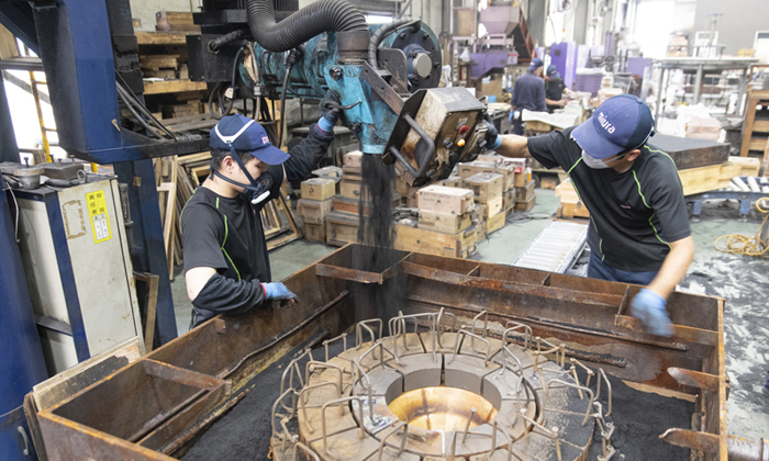 Sand mold casting